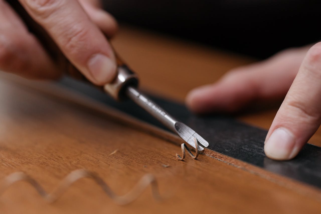 A Person Trimming a Wood Plank with and Edge 1